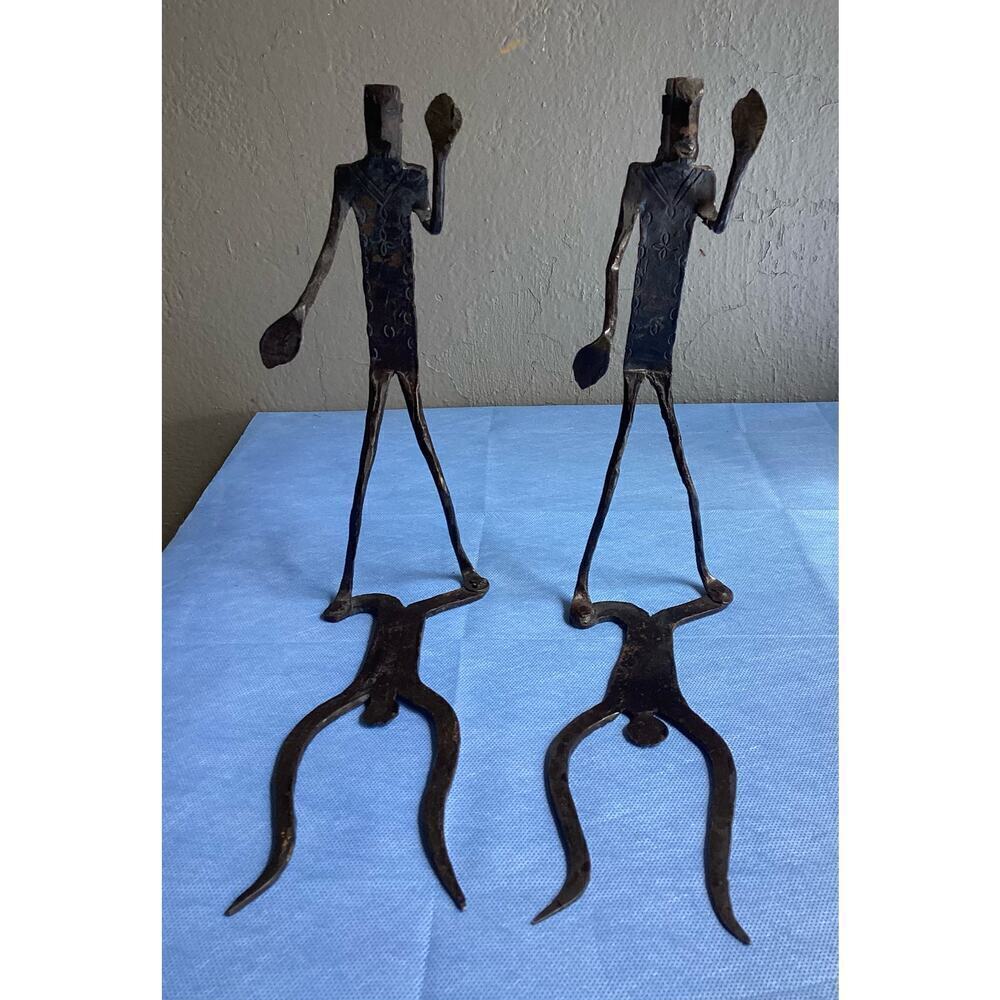 Vintage wrought iron walking man and shadow MCM bookends